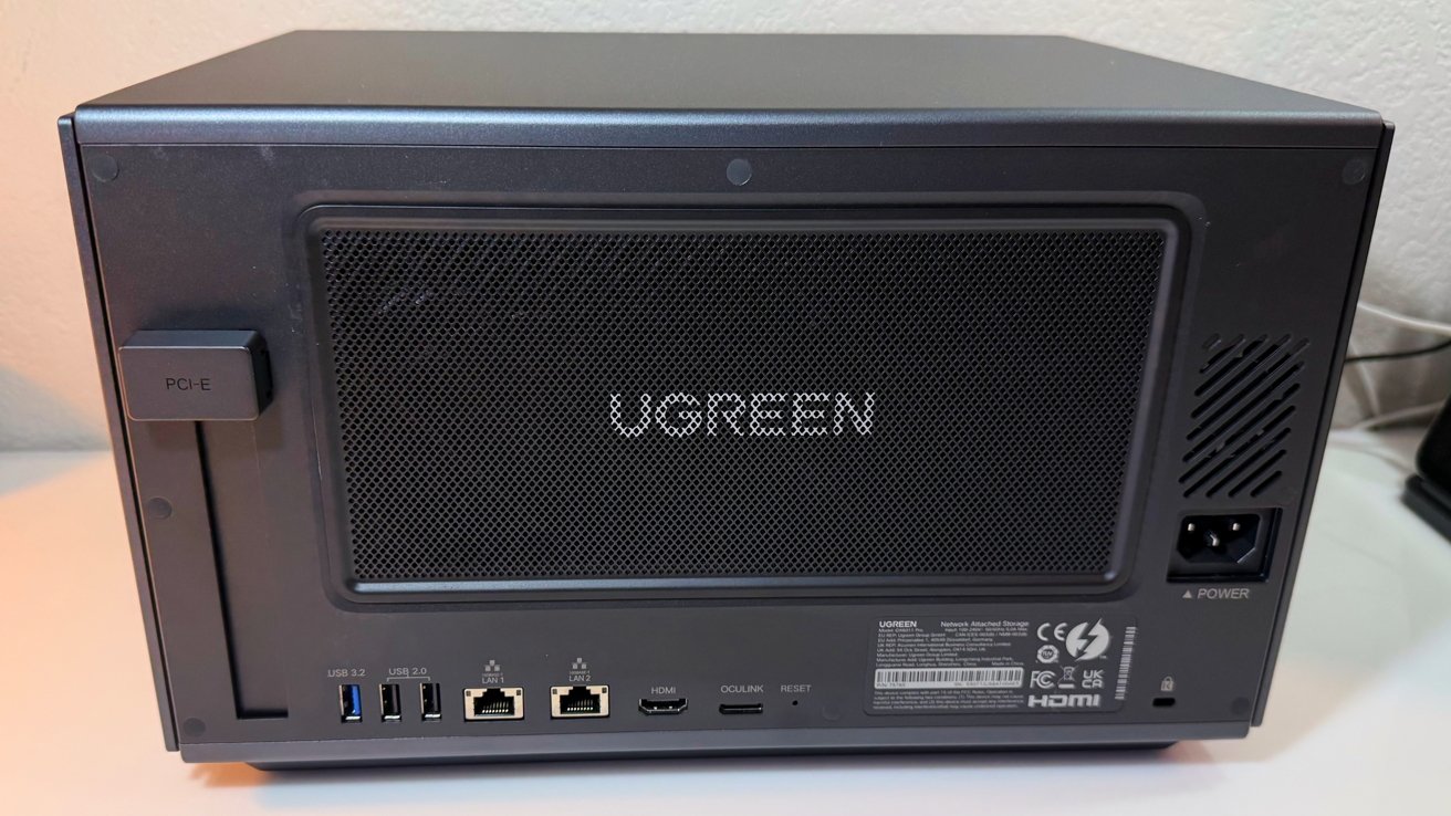 Rear view of the Ugreen iDX6011 Pro showing PCIe slot, USB ports, dual 10GbE Ethernet, HDMI, and OCuLink connector